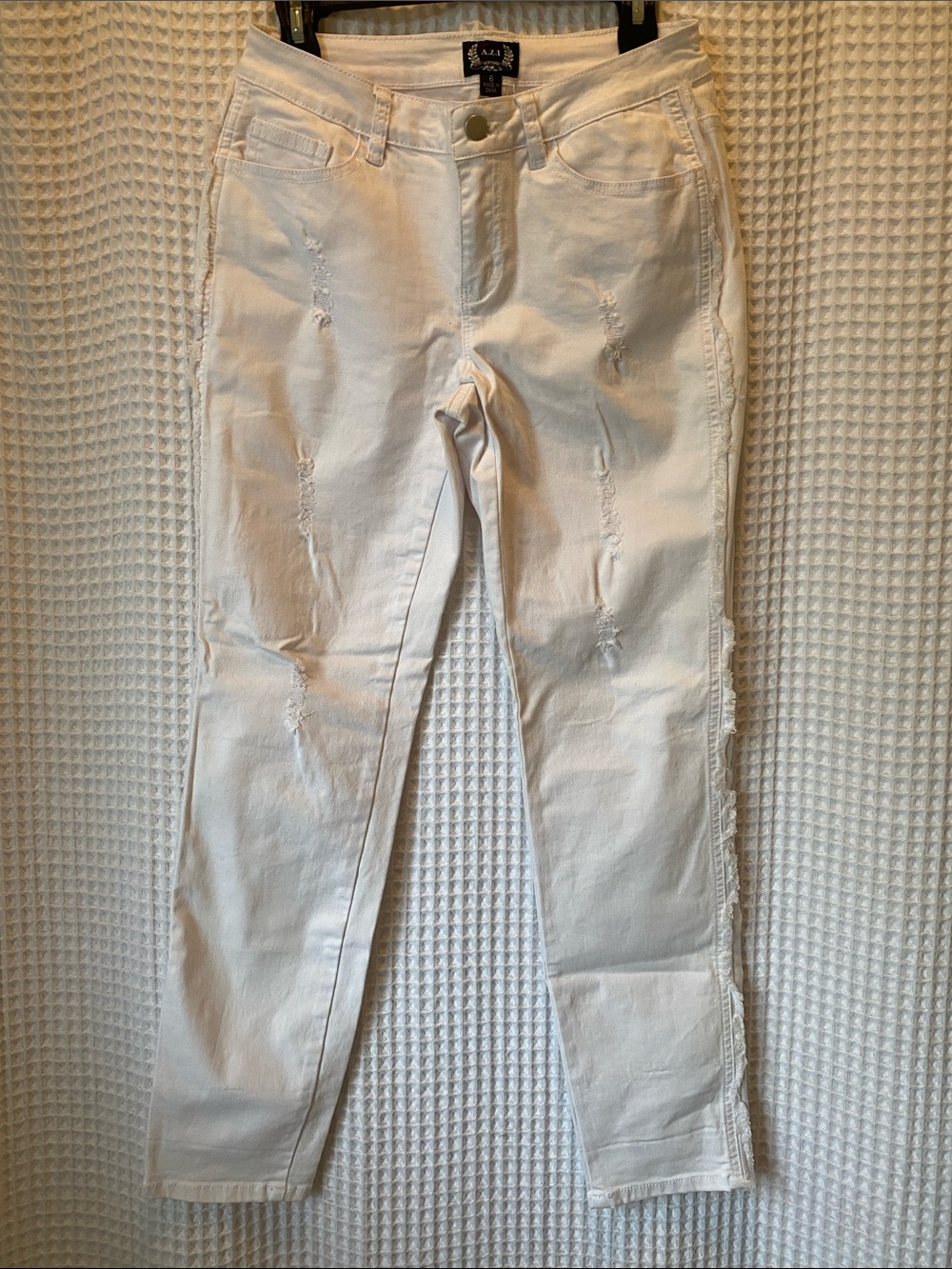 White Straight Leg Jeans with Subtle Distressing - Women